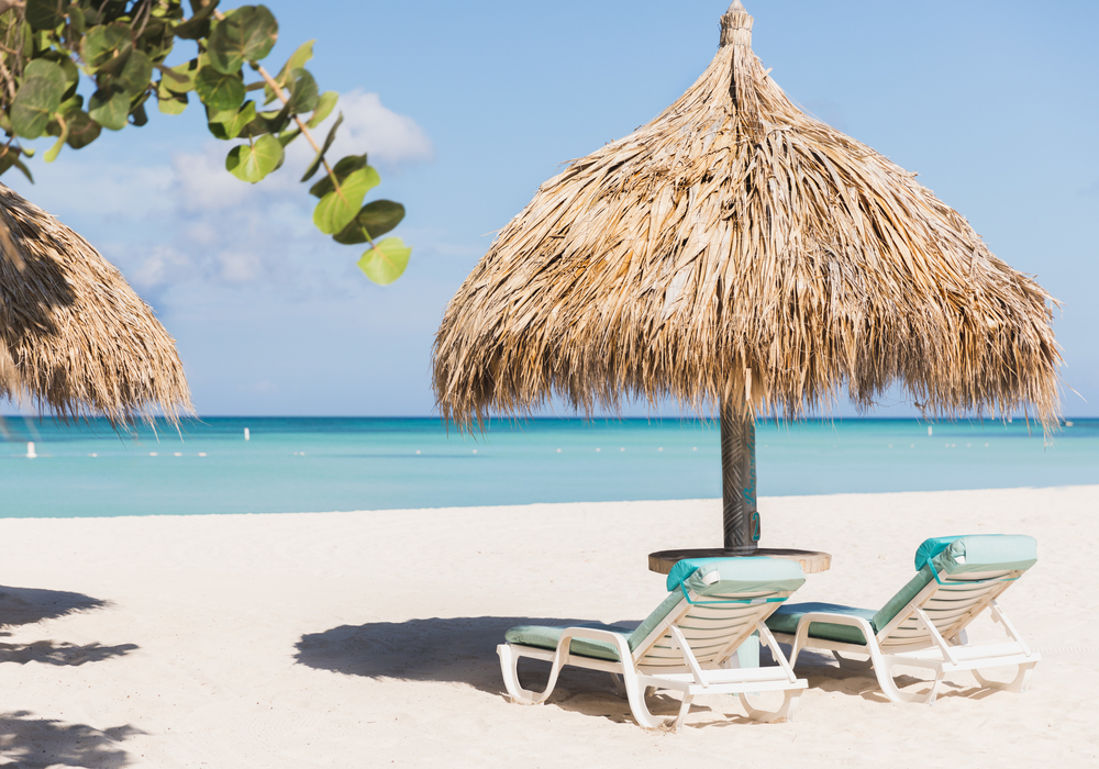Boardwalk Beach with palapa and beach chairs
