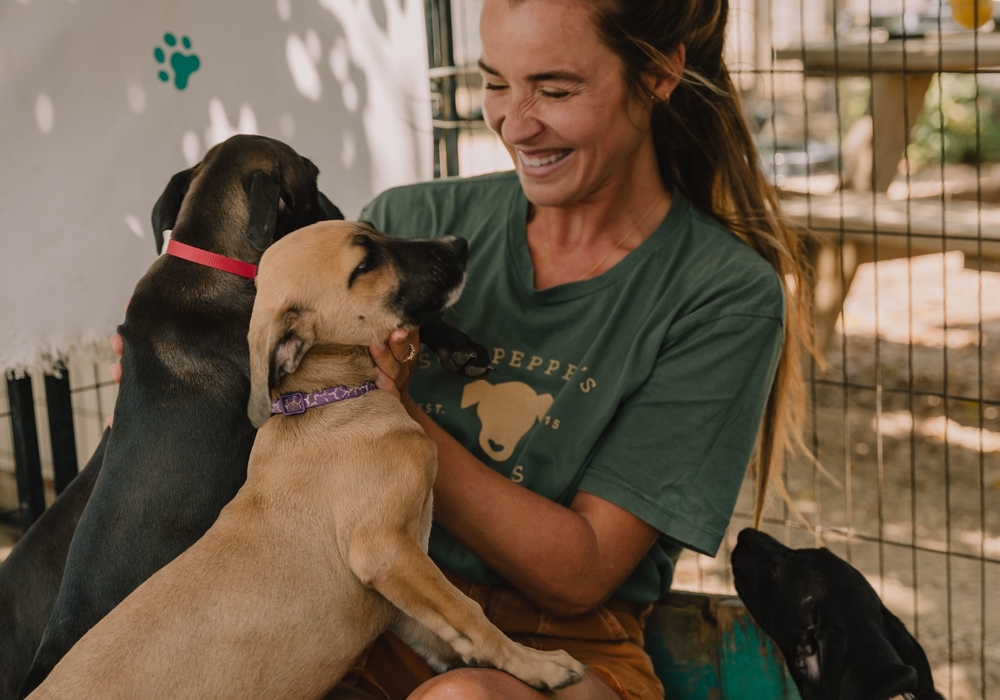 Sgt. Pepper's Friend volunteer with puppy