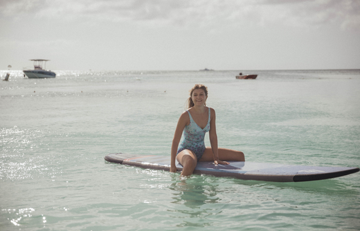 girl on surfboard in the sea