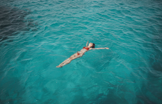 girl swimming in the sea 