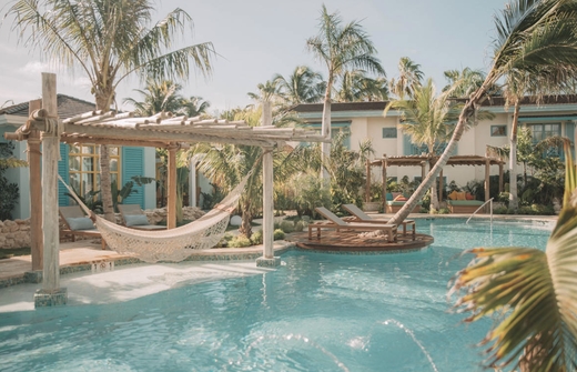 Life is never boring at our lively pool! Grab a floaty and relax until the sunset at Boardwalk!
