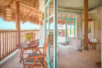 Palapa Lodge interior and exterior 